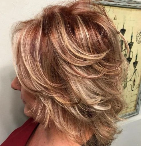 Shorter Feathered Red and Blonde Hairstyle hair